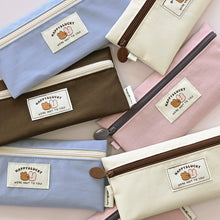 Load image into Gallery viewer, Monolike Happy and Lucky Flat Pencil Case, Brown - Slim Water-Resistant Nylon Pen Pouch, Aesthetic Pastel Stationery Organizer for Office
